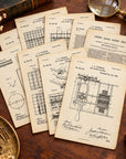 A styled flat-lay of vintage patent printouts fanned out on a wooden desk, surrounded by antique props including a magnifying glass, brass letter opener, fountain pen, old book, and dried flowers.