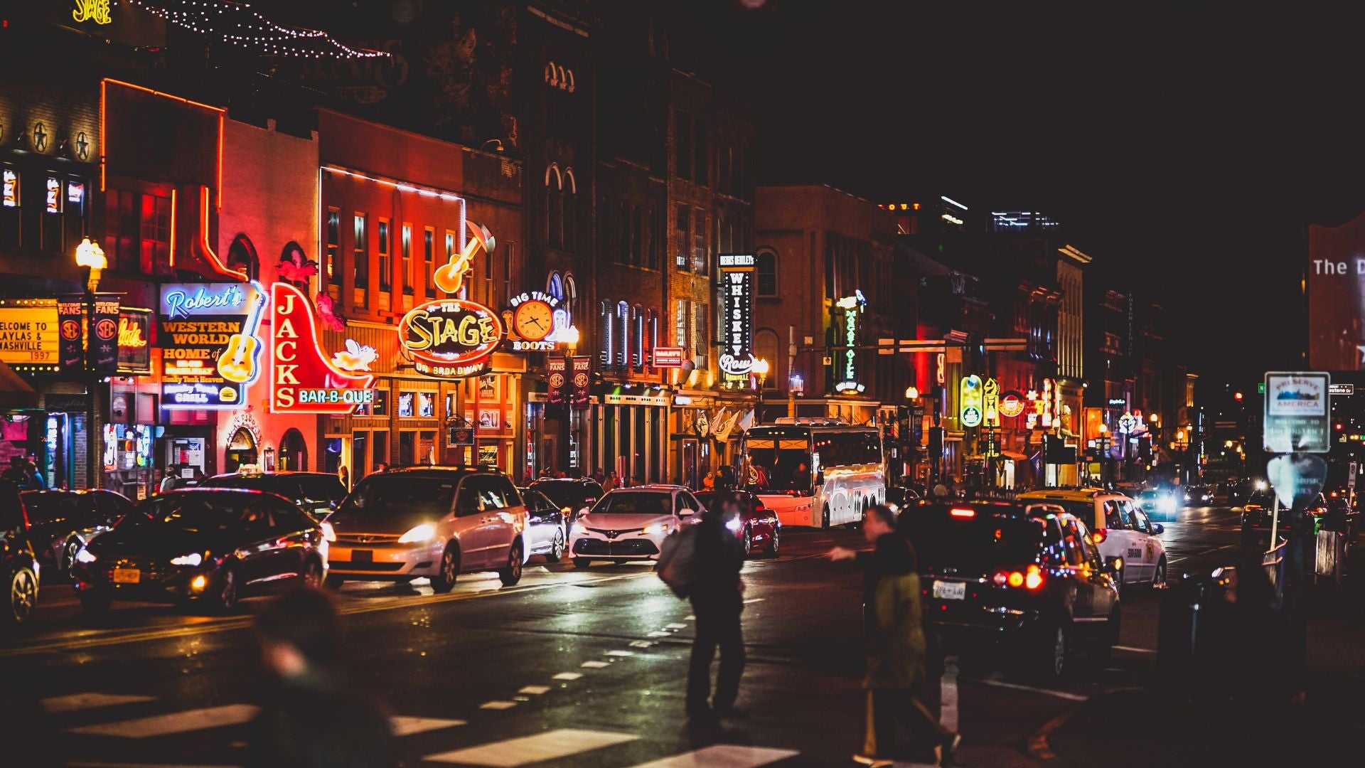 A street in Broadway, Downtown Nashville, TN at night. - History By Mail