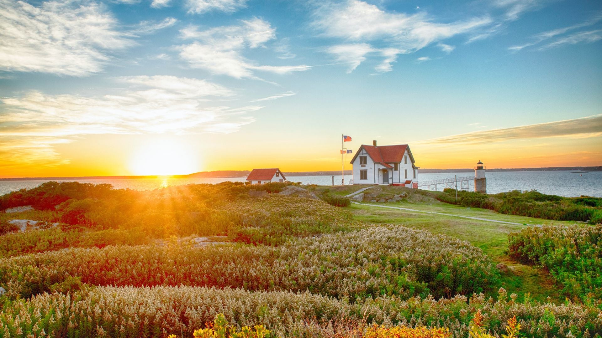 A house, a flower field, and a sunset in East Booth Bay, ME. - History By Mail