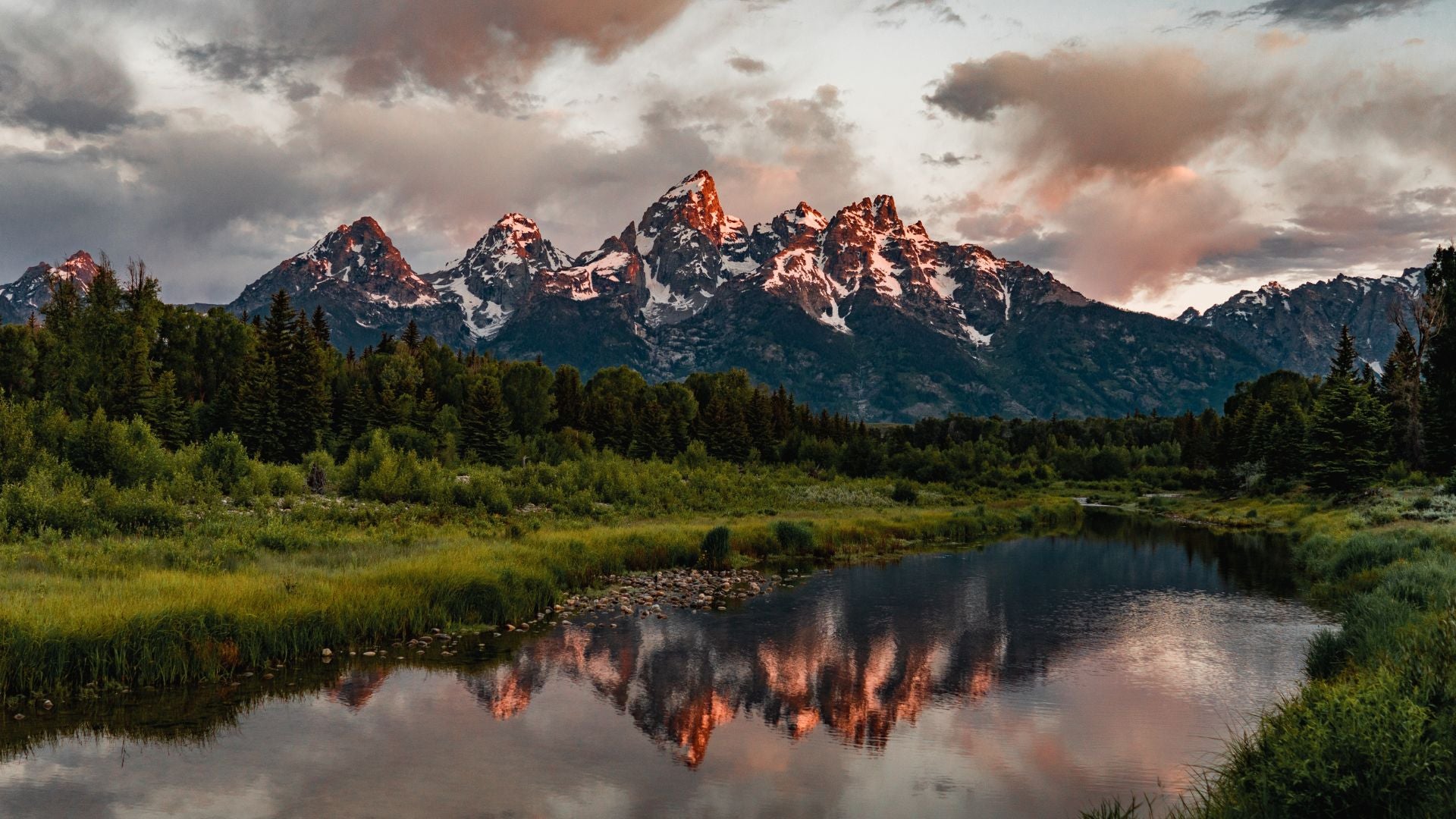 A river and a mountain range in the background of Grand Teton National Park, Wyoming. - History By Mail