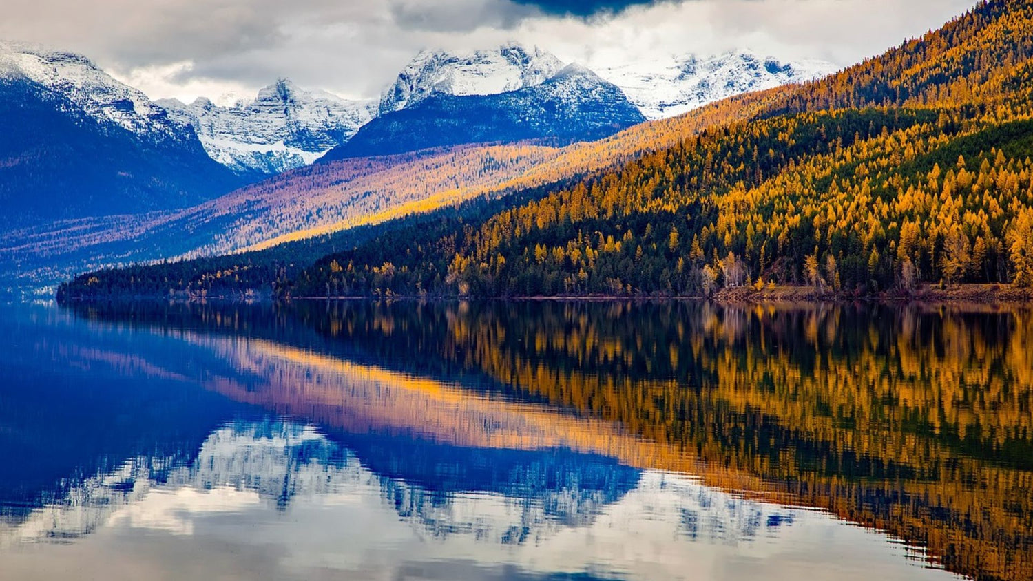 Lake McDonald, Glacier National Park, Montana. Mountain reflection on the water. - History By Mail
