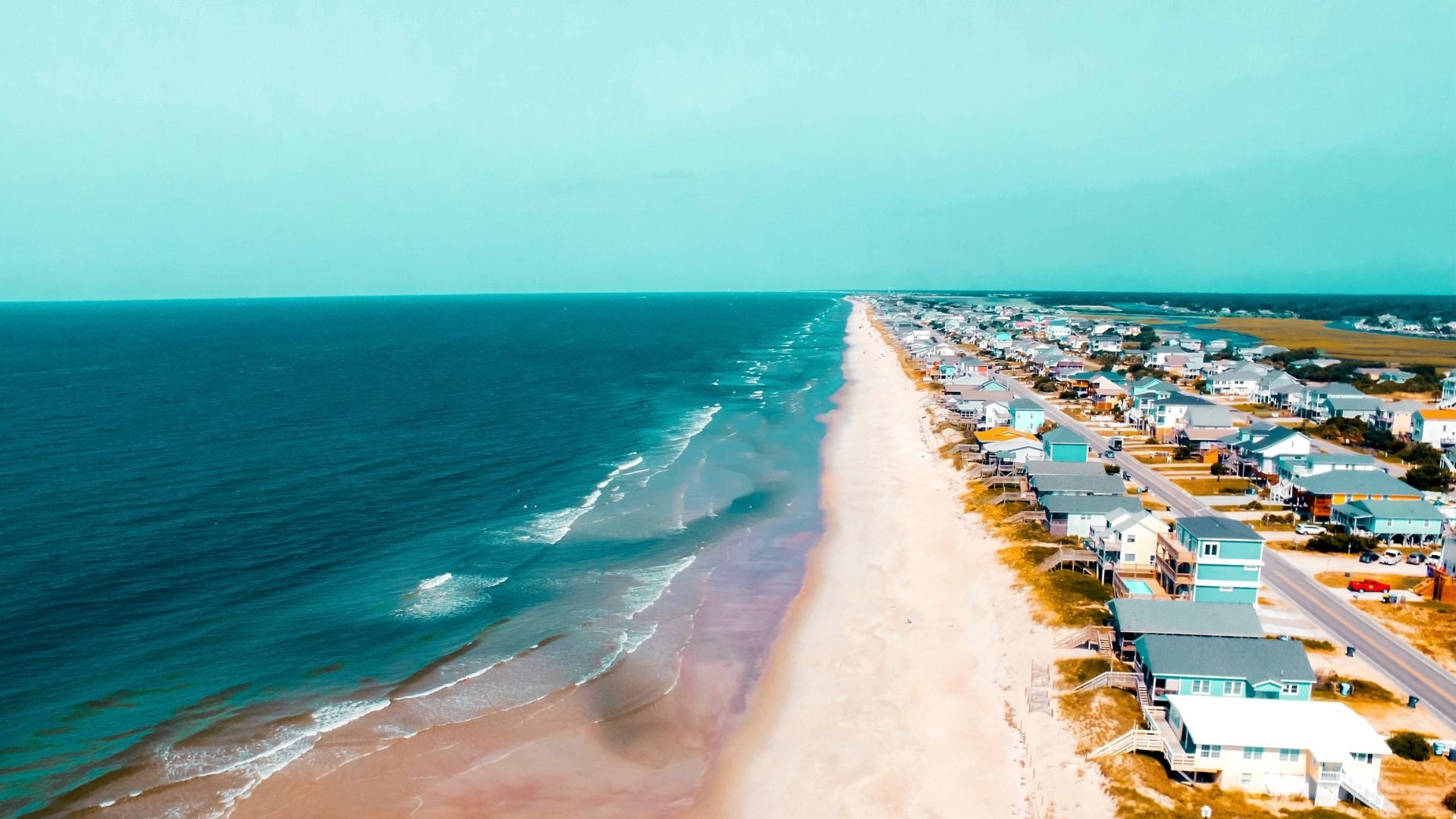Aerial view of the waves in North Topsail Beach, Onslow County, North Carolina. - History By Mail