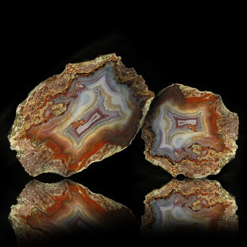 An orange agate that has curved angular banding or layers. - History By Mail
