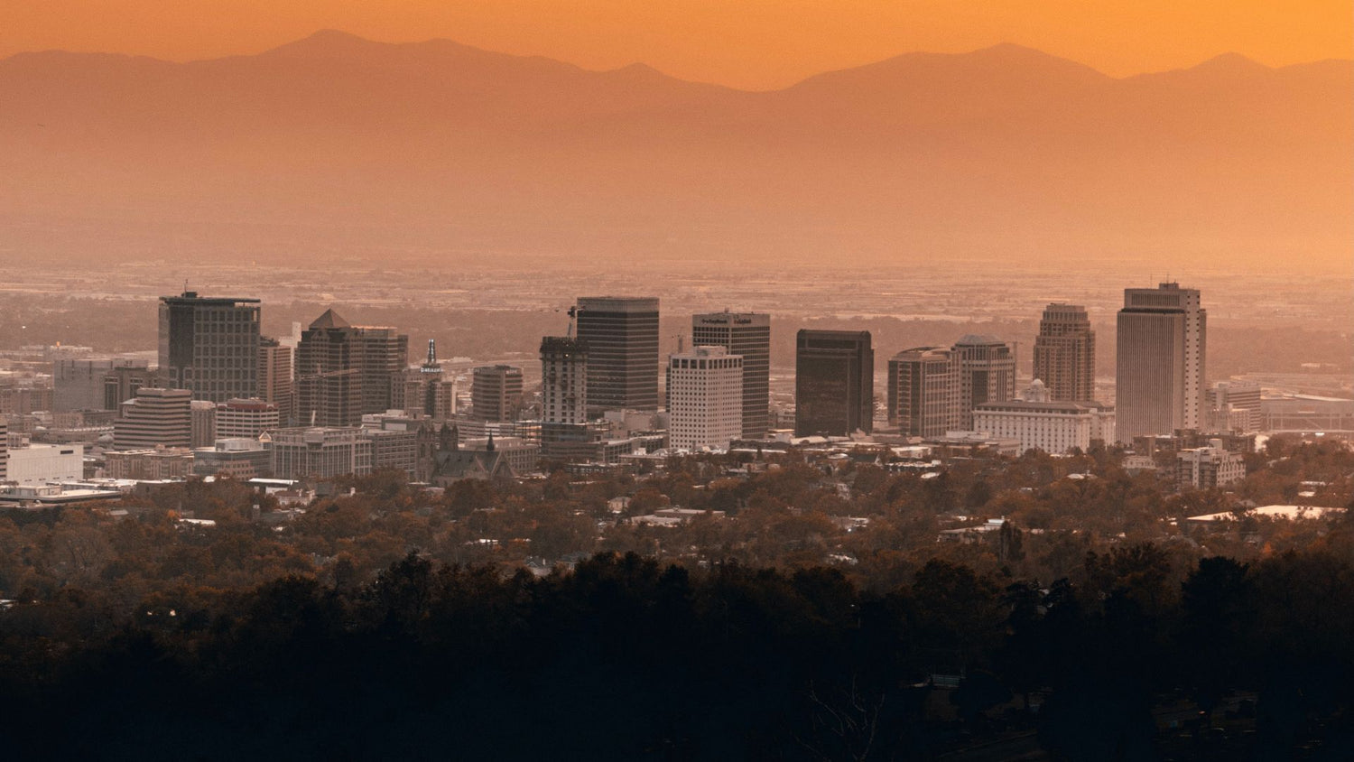 Salt Lake skyline during sunset. - History By Mail