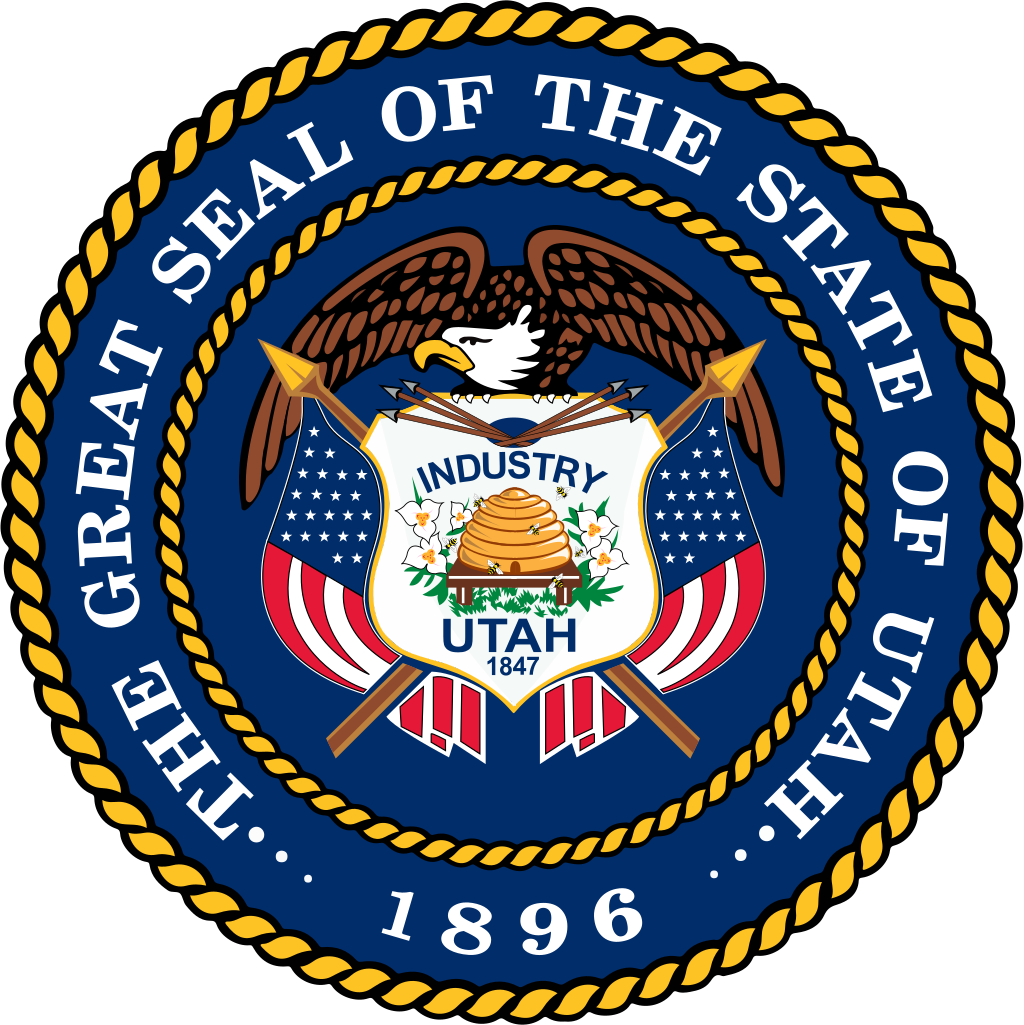 The Utah State Seal, adopted in 1896, features a shield with an American Eagle with outstretching wings on top. - History By Mail