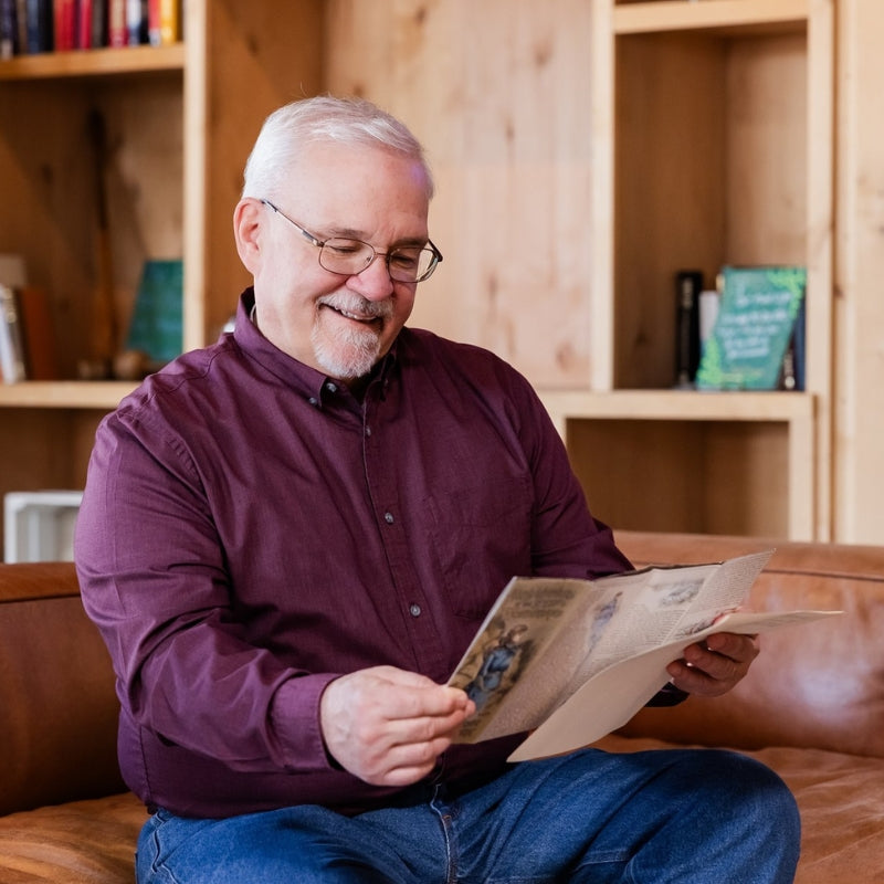 Man holding a Yellowostone Brochure